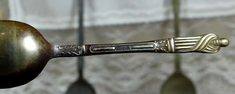 Set of three Bishop teaspoons