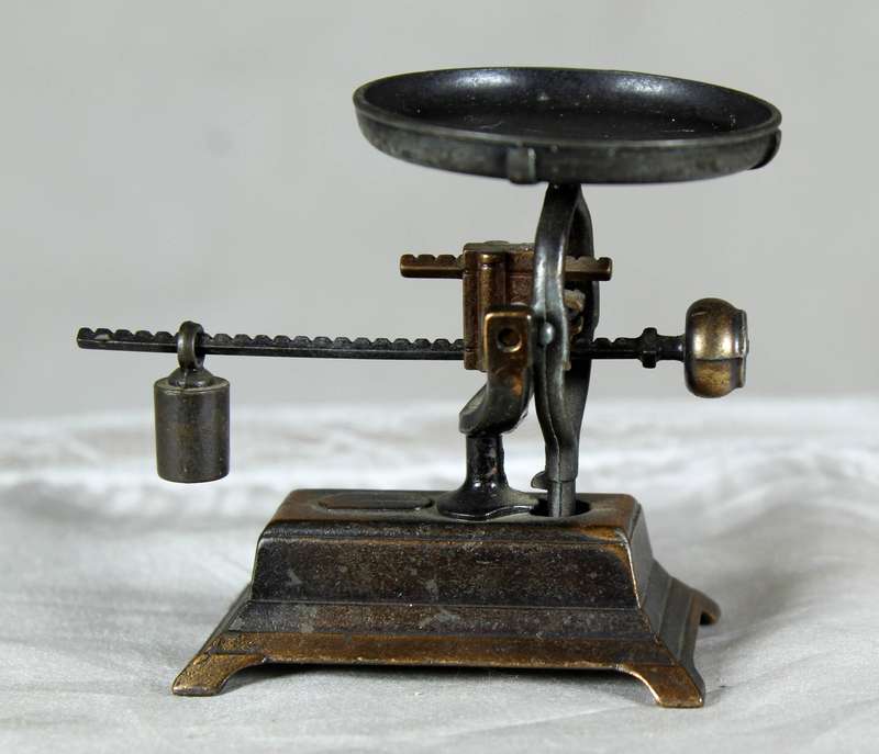 Miniature brass scale pencil sharpener