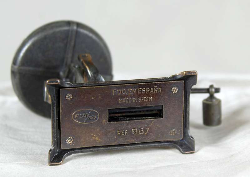 Miniature brass scale pencil sharpener
