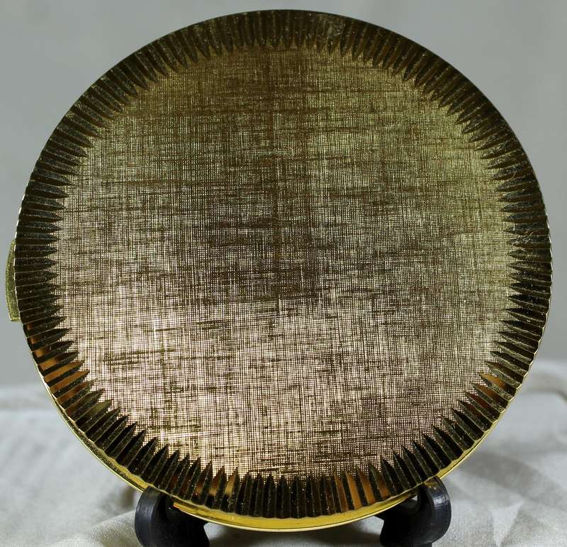 New golden powder compact