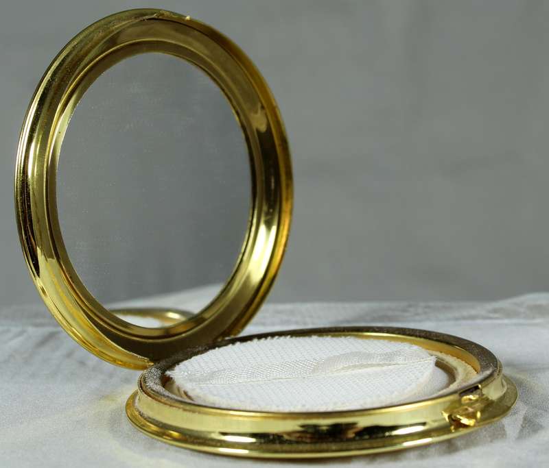 New golden powder compact