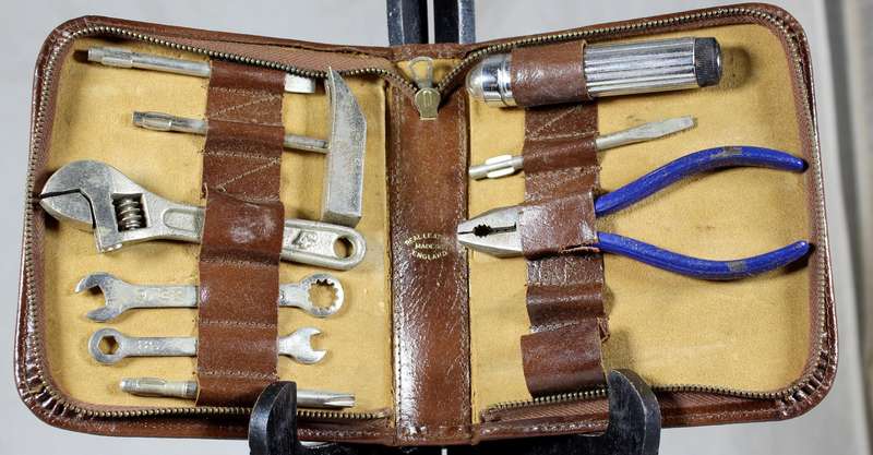 Vintage small tool set in leather pouch