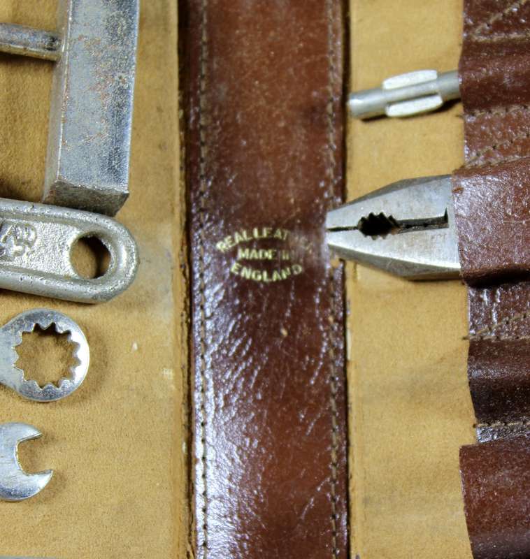 Vintage small tool set in leather pouch