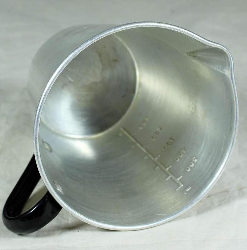 Metal measuring jug