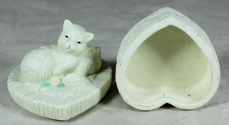 Lidded ceramic trinket box with cat playing with yarn ball