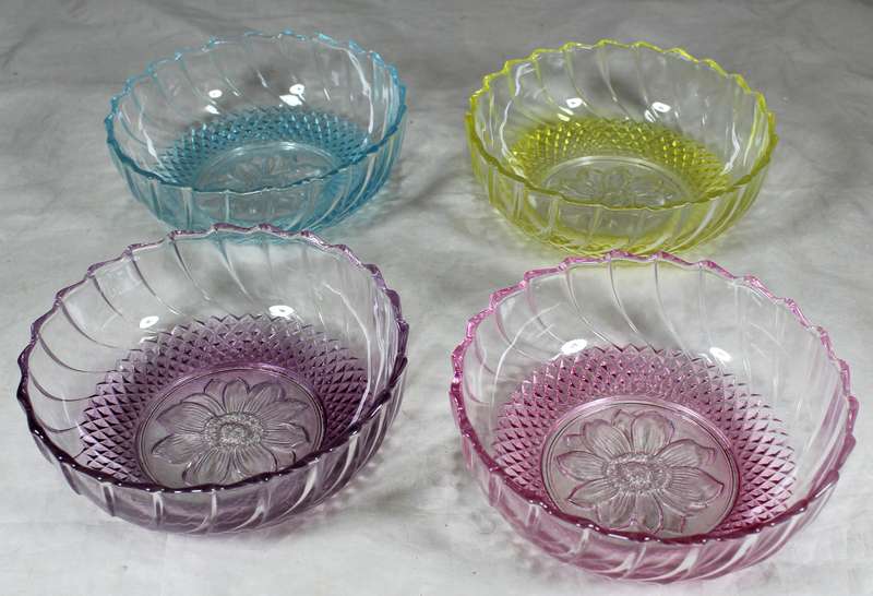 Set of four colored glass bowls