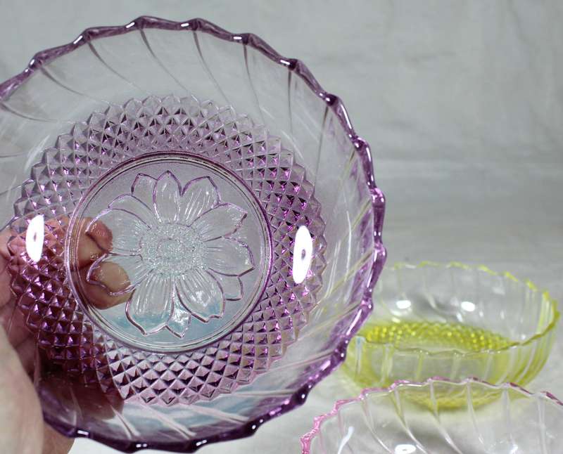 Set of four colored glass bowls