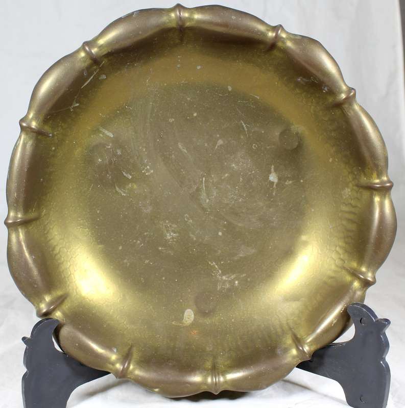Footed brass bowl