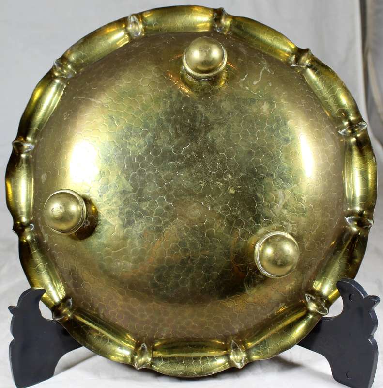 Footed brass bowl