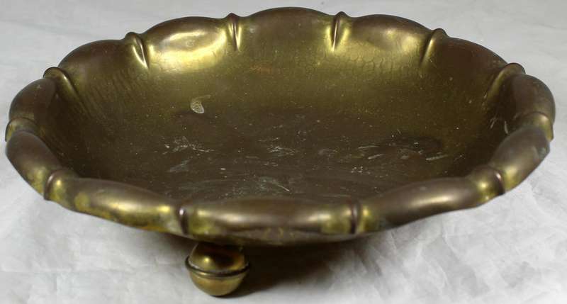 Footed brass bowl