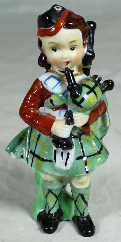Girl ceramic bagpiper