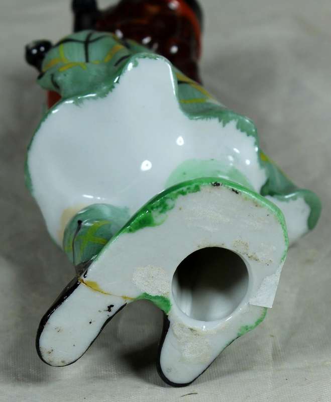 Girl ceramic bagpiper