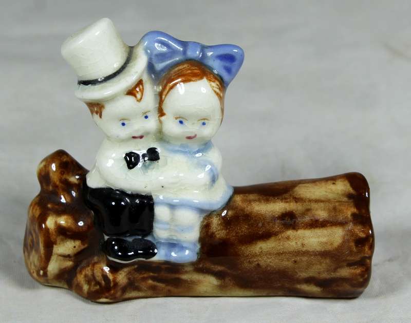 Boy and girl on a log
