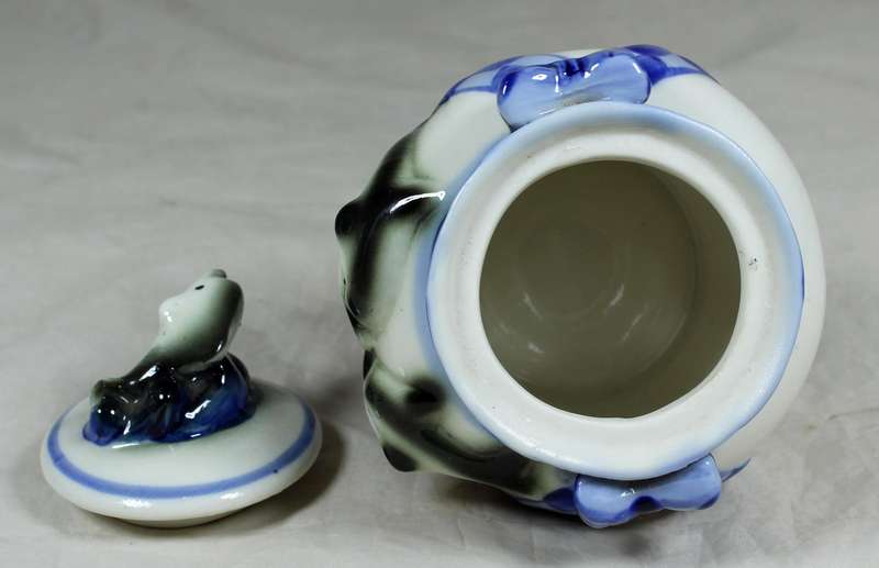 Porcelain lidded bowl with dolphins