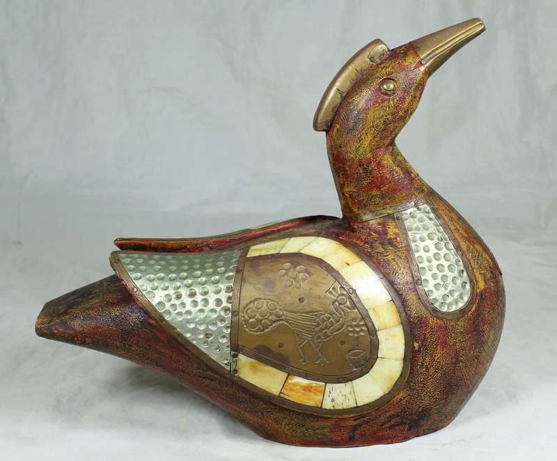 Pair of wooden ducks with metal inlay
