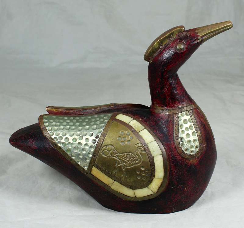 Pair of wooden ducks with metal inlay