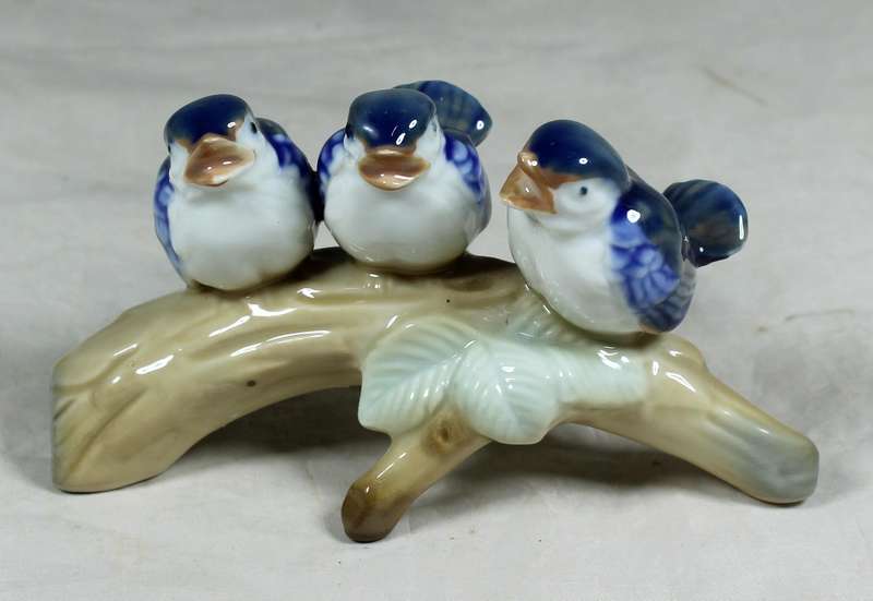 Birds singing on a log