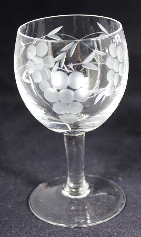 Set of eleven aperitif glasses with etched grapes motif