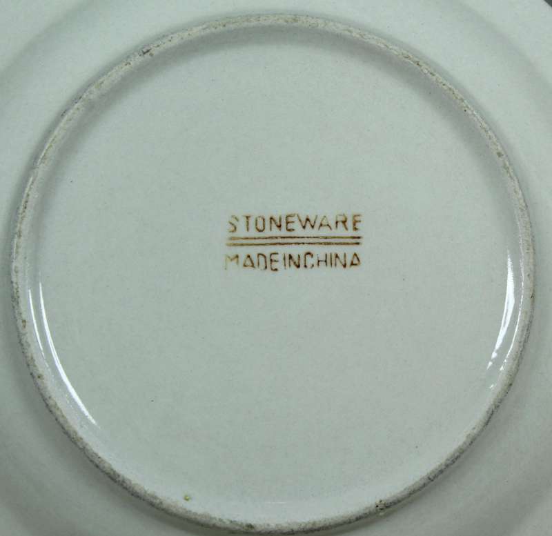 Stoneware plate with cow motif