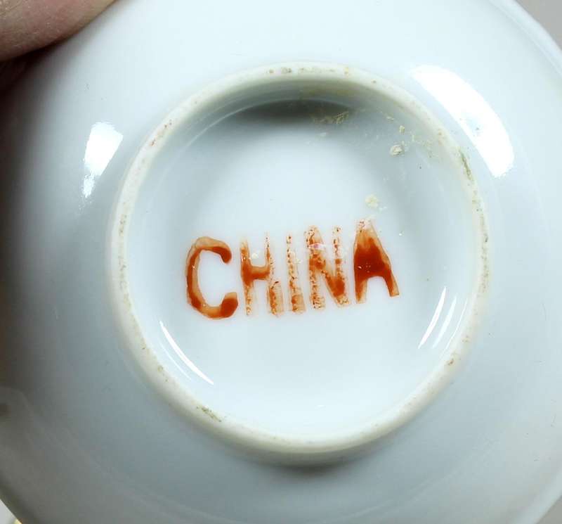 Chinese condiment bowl plus spoon