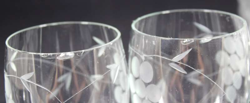 Set of six drinking glasses with etched grapes motif