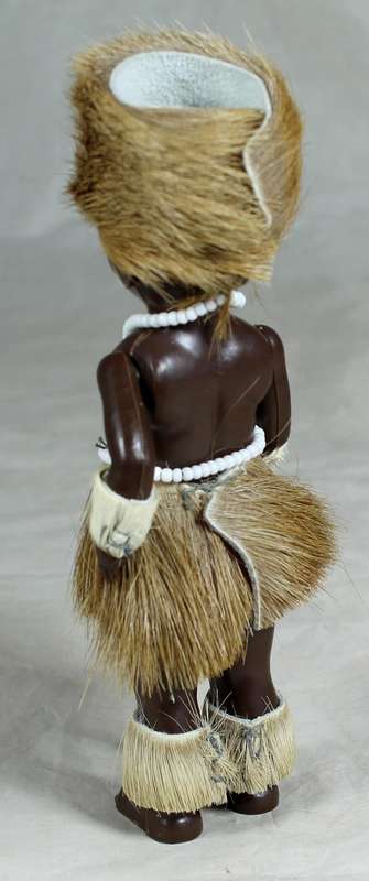 Little girl doll in traditional clothes