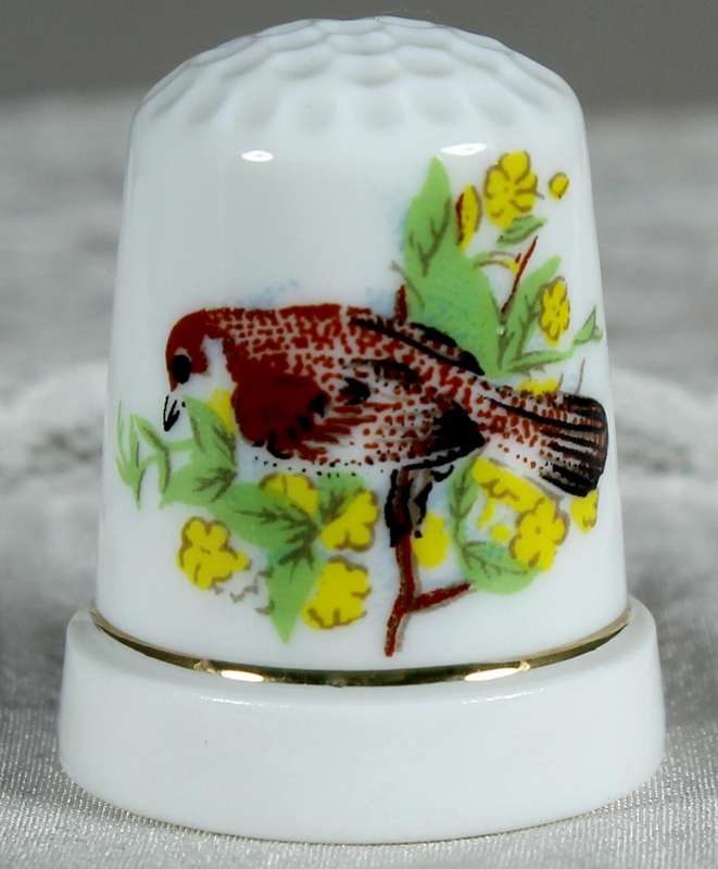 Bone China thimble - bird with yellow flowers