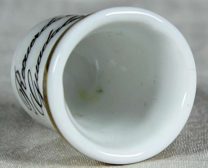 Bone China thimble - Victorian couple sitting on a log