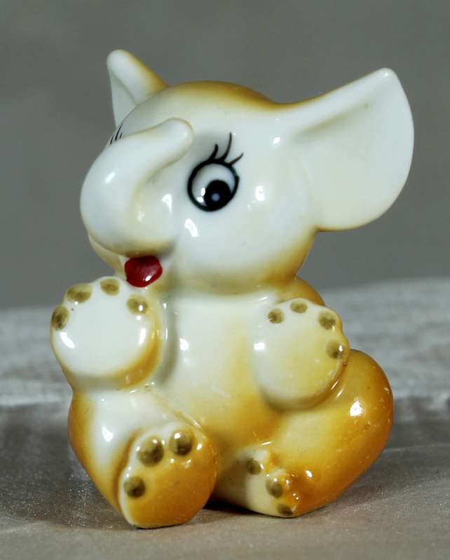 Miniature porcelain baby elephant