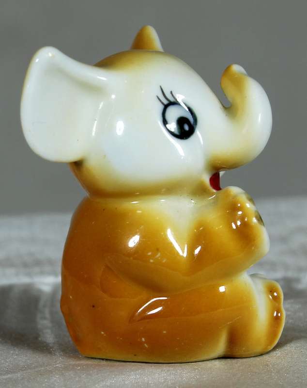 Miniature porcelain baby elephant