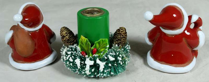 Two Santa Clause plus Christmas candle holder