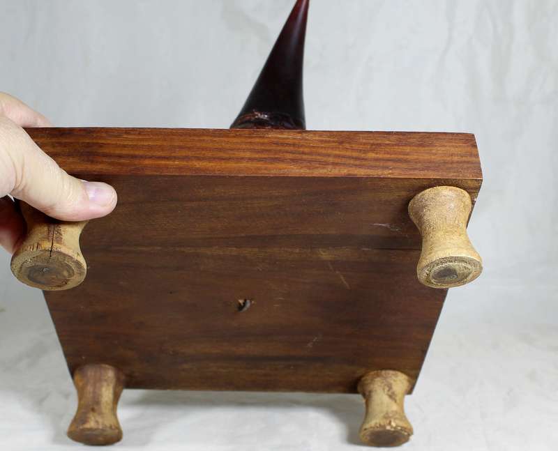 Witches candle on a wooden stand
