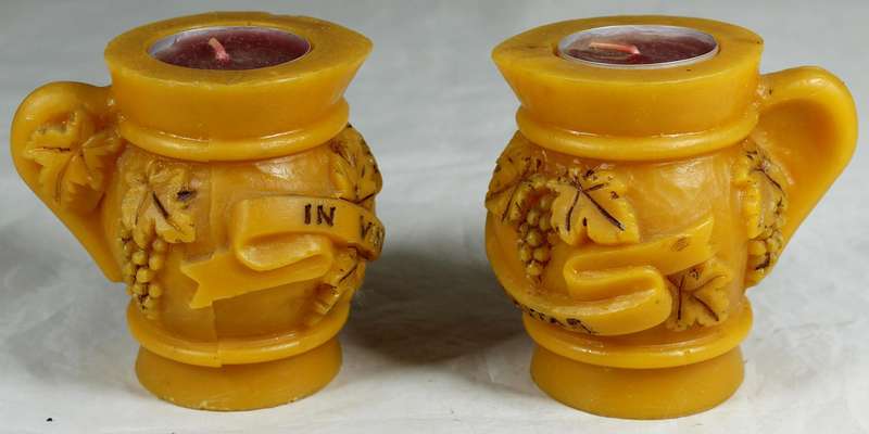 Pair of jug candles with inscription "In Vino Veritas"