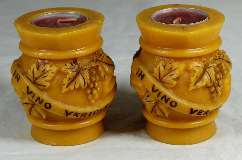 Pair of jug candles with inscription "In Vino Veritas"