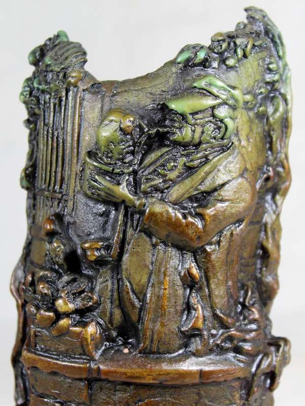 Highly detailed candle on a metal stand