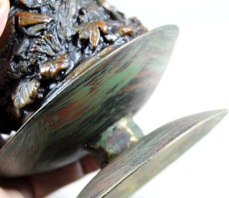 Highly detailed candle on a metal stand