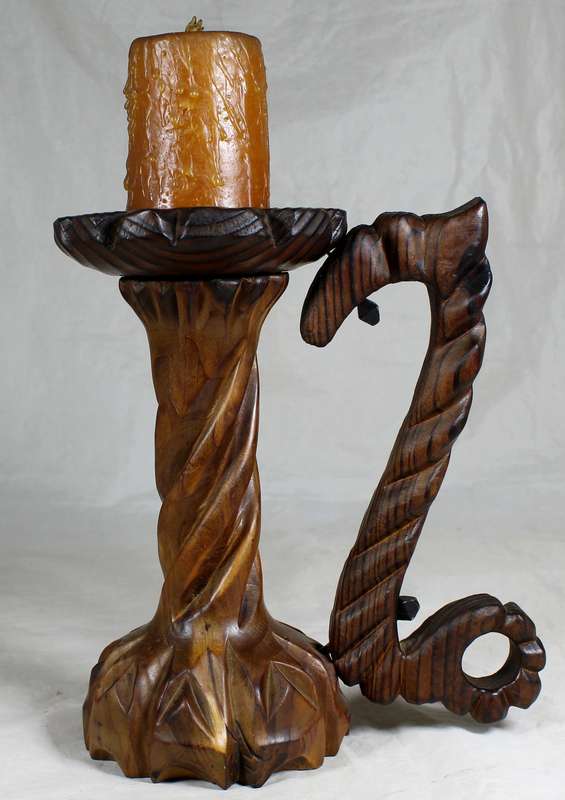 Carved wooden candle holder with handle