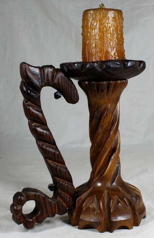 Carved wooden candle holder with handle