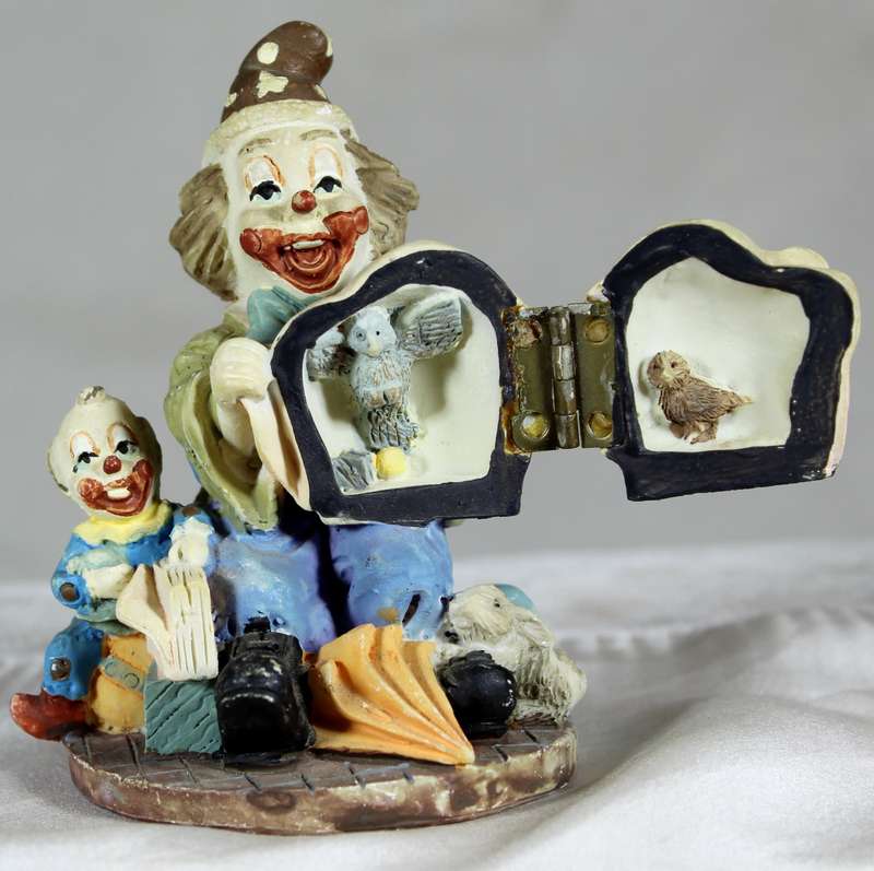Ceramic clown with magic pot