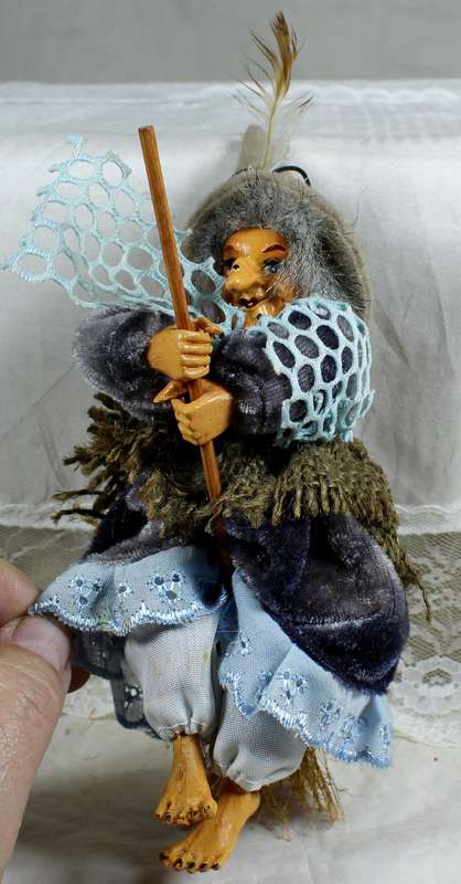 Witch riding a broom