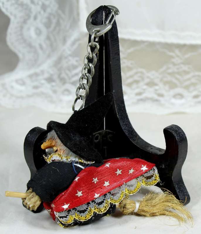 Witch in a red dress riding a broom - keyring