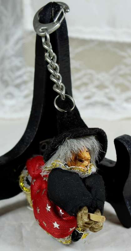 Witch in a red dress riding a broom - keyring