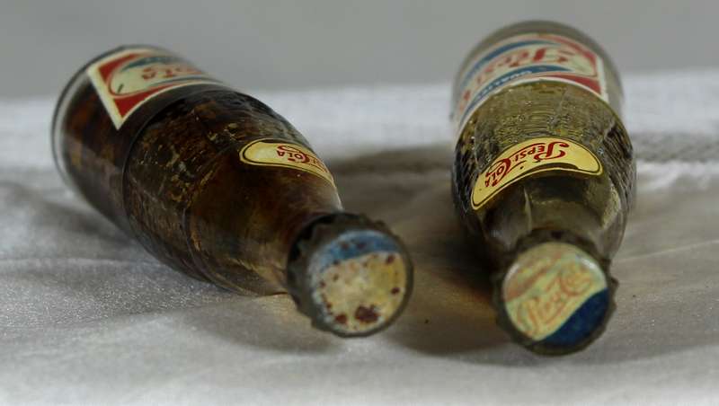 Pair of miniature Pepsi-Cola bottles
