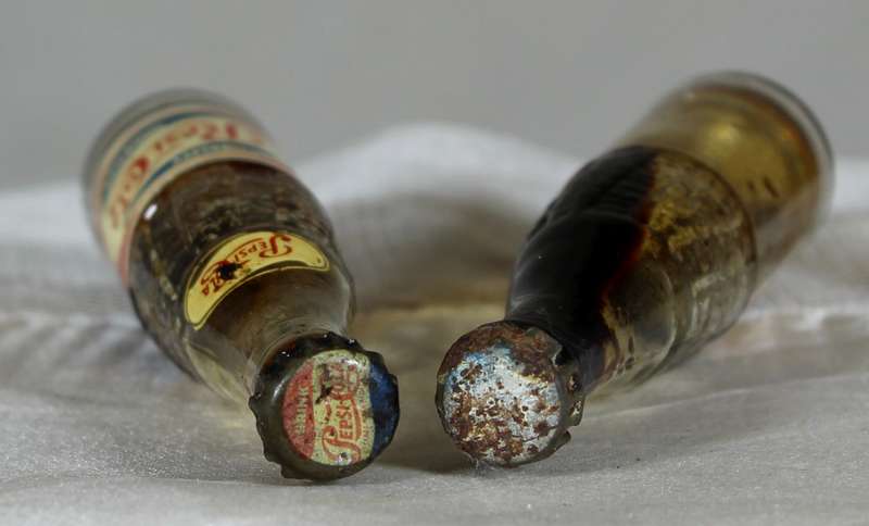 Pair of miniature Pepsi-Cola bottles