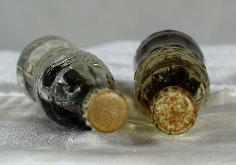Pair of miniature Coca-Cola bottles