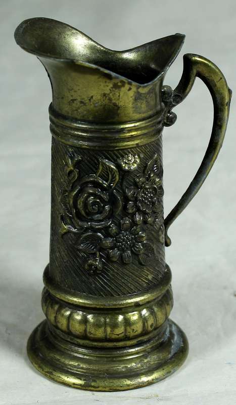 Ornate metal jug