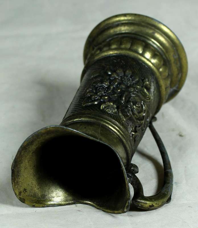 Ornate metal jug