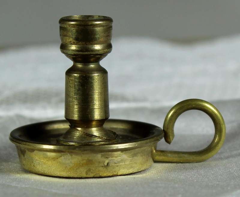 Miniature brass candle holder