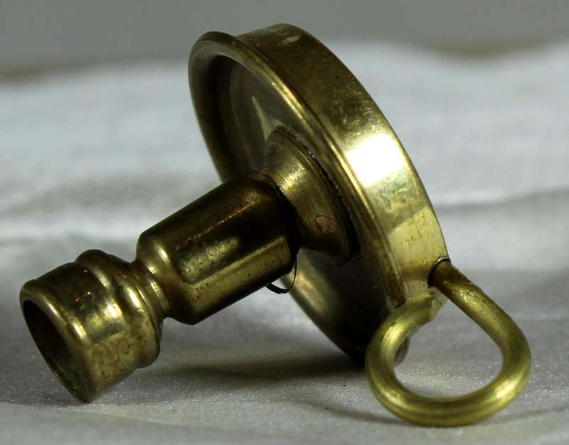 Miniature brass candle holder