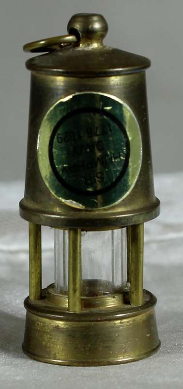 Miniature brass miners safety lamp